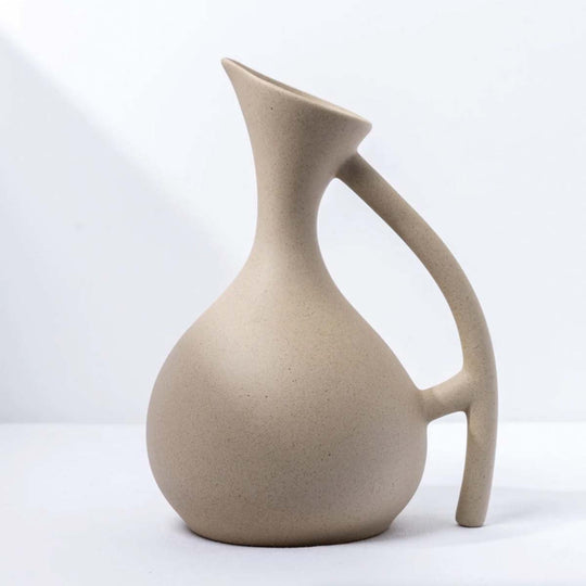 Elegant handcrafted ceramic jug with matte finish | Modern organic design | Perfect for serving drinks - matching cups available!