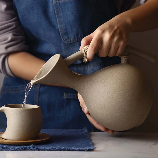 Elegant handcrafted ceramic jug with matte finish | Modern organic design | Perfect for serving drinks - matching cups available!