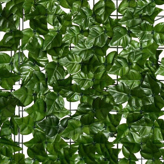 Fence with artificial leaves