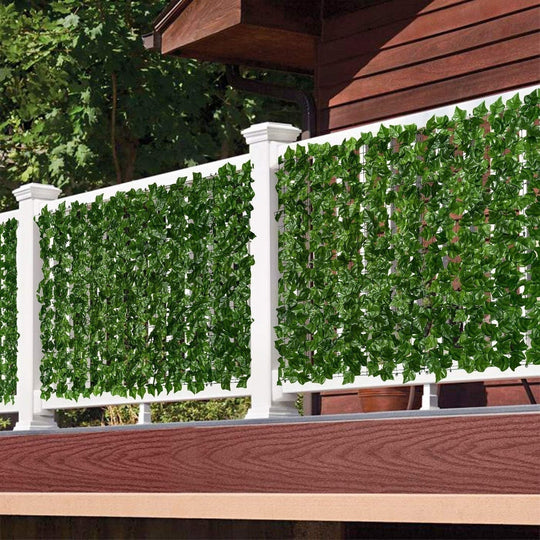 Fence with artificial leaves