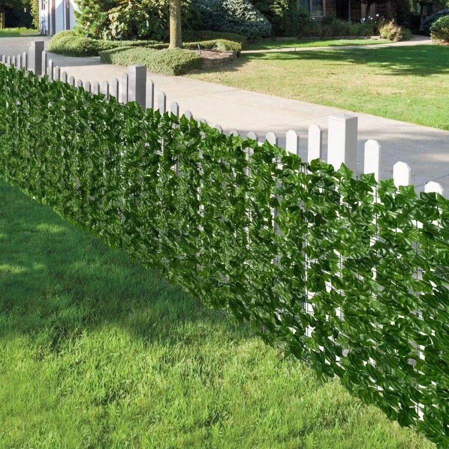 Fence with artificial leaves